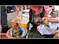 Người bán hàng rong bán rùa và cóc ở Tân Châu Trung Sơn Trung Quốc 賣草龜 蛤蟆 坦洲市場外面 中山坦洲