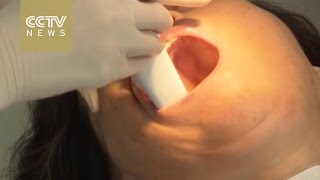 Watch Extraordinary 3D printing of a false tooth in seconds