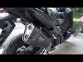 AKRAPOVIC exhaust installation on a YAMAHA TMAX 560