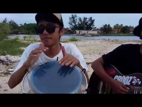 musisi-pantai-nyanyi-lagu-reggae---shaggy-dog-disayidan