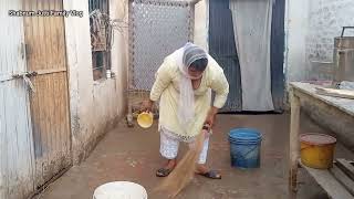 Village Girl Floor Cleaning