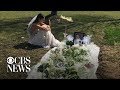 Woman visits fiancé's grave in wedding dress the day after they would have married