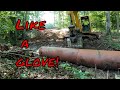 Installing some large clay culvert pipe the dangerous way with the 120 and Jerry