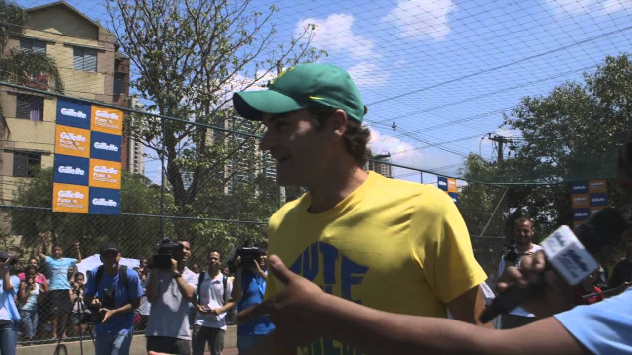 Roger Federer plays football with CUFA kids from São Paulo favela