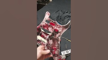 my friend and I made a custom pickguard for his guitar