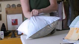 Stuffing a pillow form into a square pillow cover