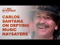 Capture de la vidéo Carlos Santana On Defying Music Naysayers | The Big Interview