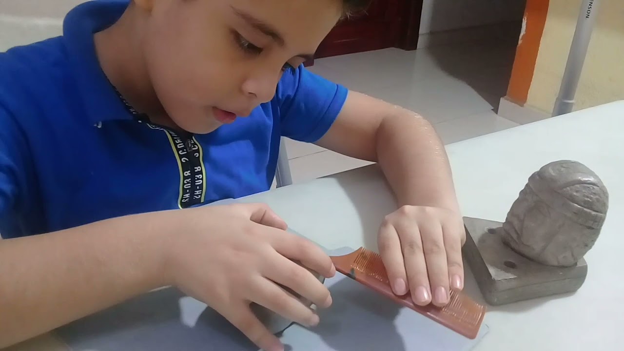 haciendo una cabeza olmeca con plastilina - YouTube