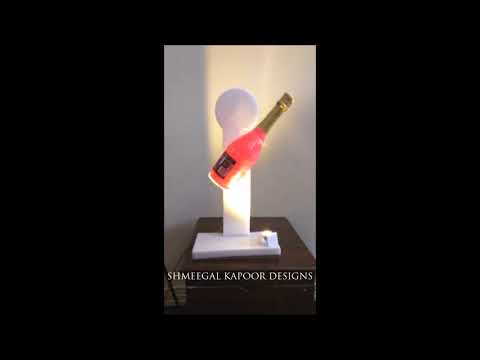 Rotating Bottle Display by Shmeegal Kapoor Designs