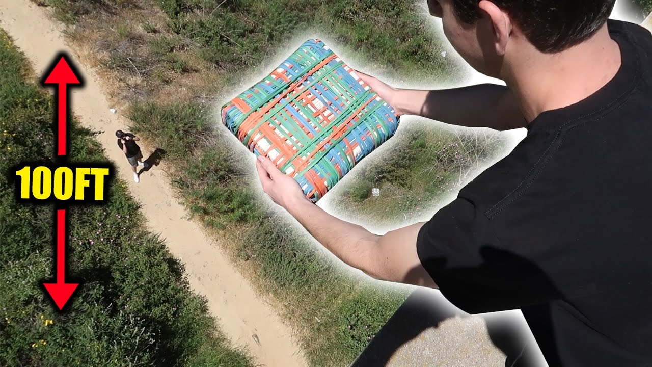 vlogs in spanish CAN 10,000 RUBBER BANDS PROTECT AN XBOX FROM 100FT DROP?! | FaZe Rug