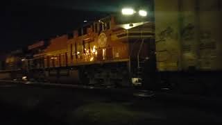 Empty tank train, NS 65D, w/ NS 8114 in trail climing through Raleigh, NC
