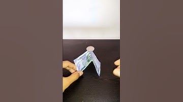 simple science trick for kids to do at home currency note and penny coin balance experiments #Shorts