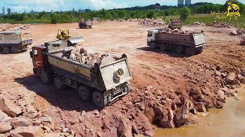 Nice Bulldozer Show Technique Skill Operator Push Stone in Water and Dump Truck Delivery Rock