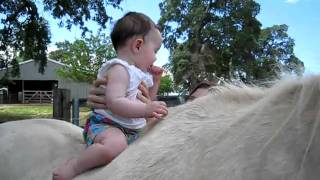 Evelyn on horseback