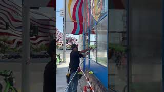 Our tech Omar cleaning the windows at the famous Johnnie’s Diner on Wilshire Blvd and Fairfax ave.