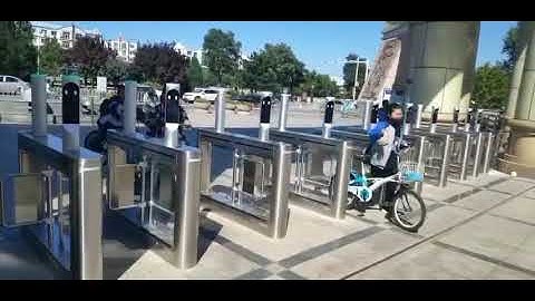 Swing gate turnstile with facial recognition used in high school