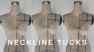 Draping bodice with neckline tucks