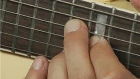 Root Position Octave Up of Eb Minor Guitar Chord on the Middle Top Strings