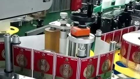 Round bottle front and back side labeling machine