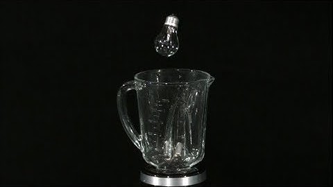 Slow Motion Light Bulb Exploding in a Blender Caught on High Definition HD Slow Mo Video Camera Shot