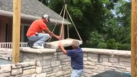 Setting limestone coping w crane