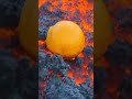 Throwing orange into the lava at Litlihrutur volcano, 2023