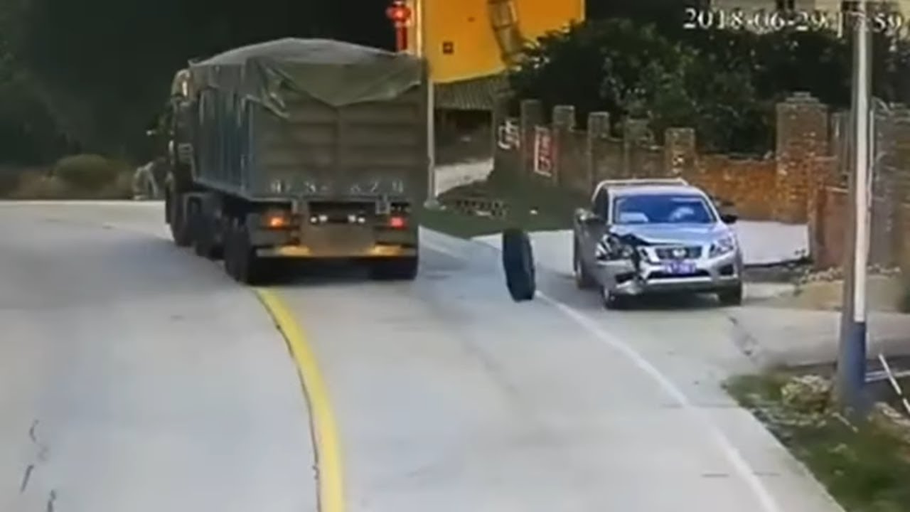 Two Tires Fall Off A Moving Truck and DESTROY This Parked Car YouTube