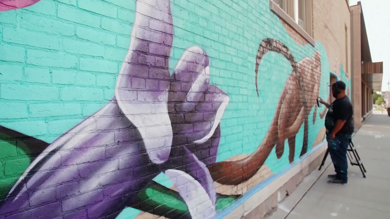 NoMi Gems - IVAN ROQUE - Mural Artist