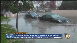 Transit bus falls into sinkhole caused by Oceanside water main rupture