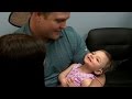 Baby born deaf hears parents voices for the first time