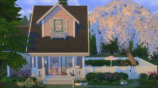 building a pink tiny house in the sims!