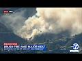 Brush fire burns along 405 Freeway in Sepulveda Pass amid hot temperatures