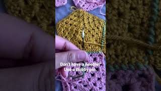 Don’t have a needle? Use a Bobby pin to stitch your patches together!