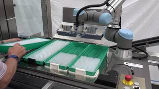 Famous UR5 collaborative robot loading parts onto a conveyor Wealth