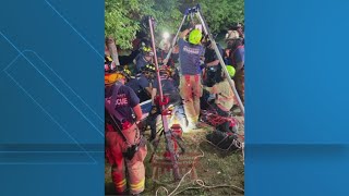 Crews rescue man stuck in 15-foot deep manhole