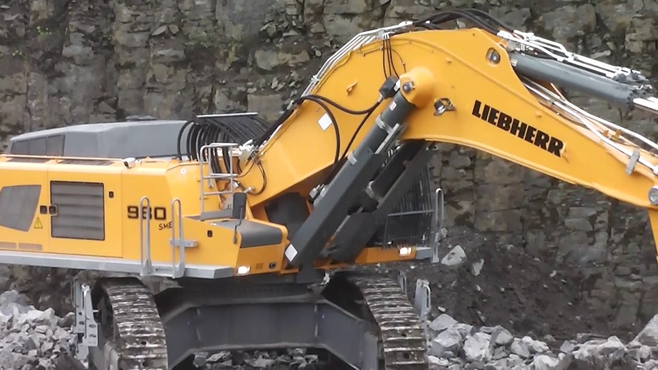 Liebherr R 980 SME excavator load Komatsu HD605 YouTube