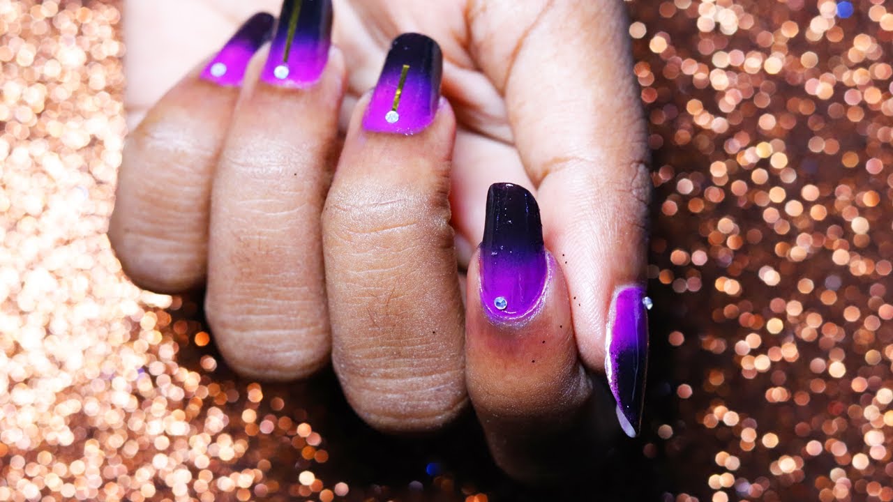 2. 50+ Purple Nail Art Ideas - wide 11