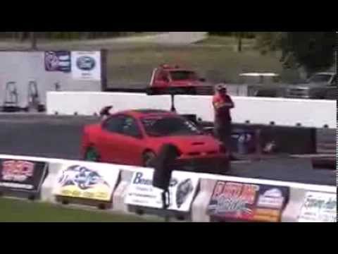Little Dodge Neon beating up on camaro at New England Dragway