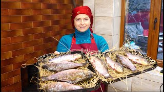We cook crucian carp on straw in a wood-fired oven according to an old recipe. Ukrainian cuisine