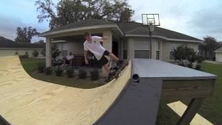 Trey 5-0 in slow motion on the half pipe.