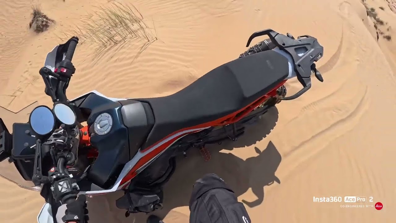 Yamaha Tenere with KTM 890 in dunes 