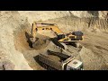 Caterpillar 385C LME Excavator Loading Trucks