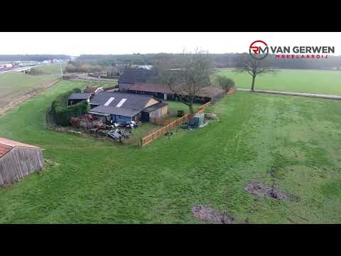 Karakteristieke woonboerderij in het buitengebied van Asten