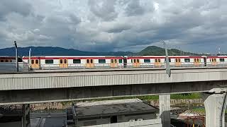 {Test Train} The New MRT Putrajaya Line Train is passing by at Damansara Damai.