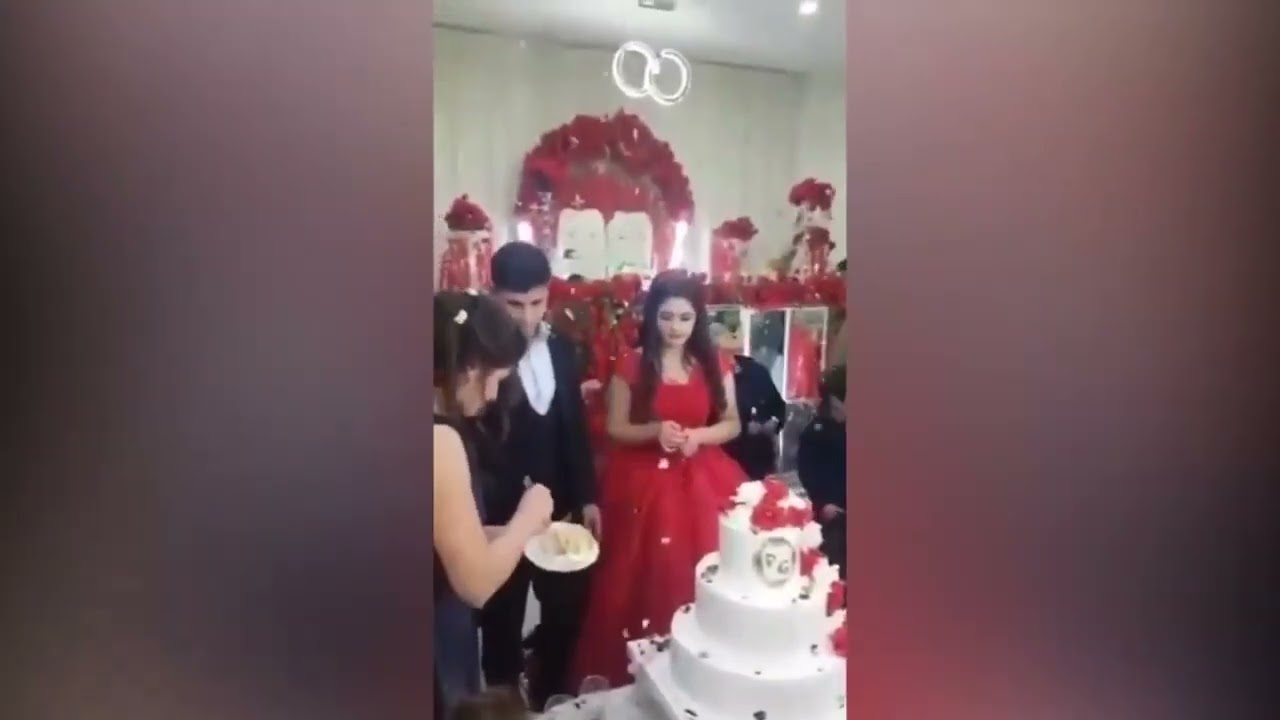 The groom got very angry at the wedding cake cutting ceremony. The bride and guests were very scared