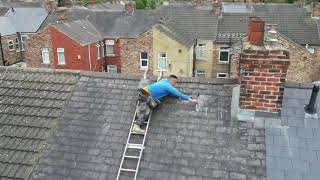 Man fixing a roof - slate repairs #roofing #repair #drone #roof #viral