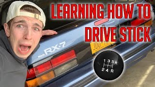 LEARNING HOW TO DRIVE STICK IN A MAZDA RX7!!!!!!!