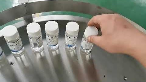 Auto adhesive sticker round bottle wrap around labeling machine SKILT