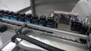 Shelf ready label orientation in an automatic tray loader