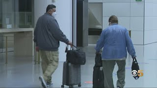 COVID: Biden Administration's New Mask Rules Take Effect For Travelers